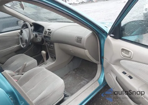 1999 Toyota Corolla Ce из США, поврежденный, VIN 1NXBR12E8XZ259296